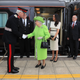 Queen Elizabeth is greeted, along with Meghan, Duchess of Sussex, as they arrive to open the new Mersey Gateway Bridge on June 14, 2018, in the town of Runcorn, Cheshire, England.